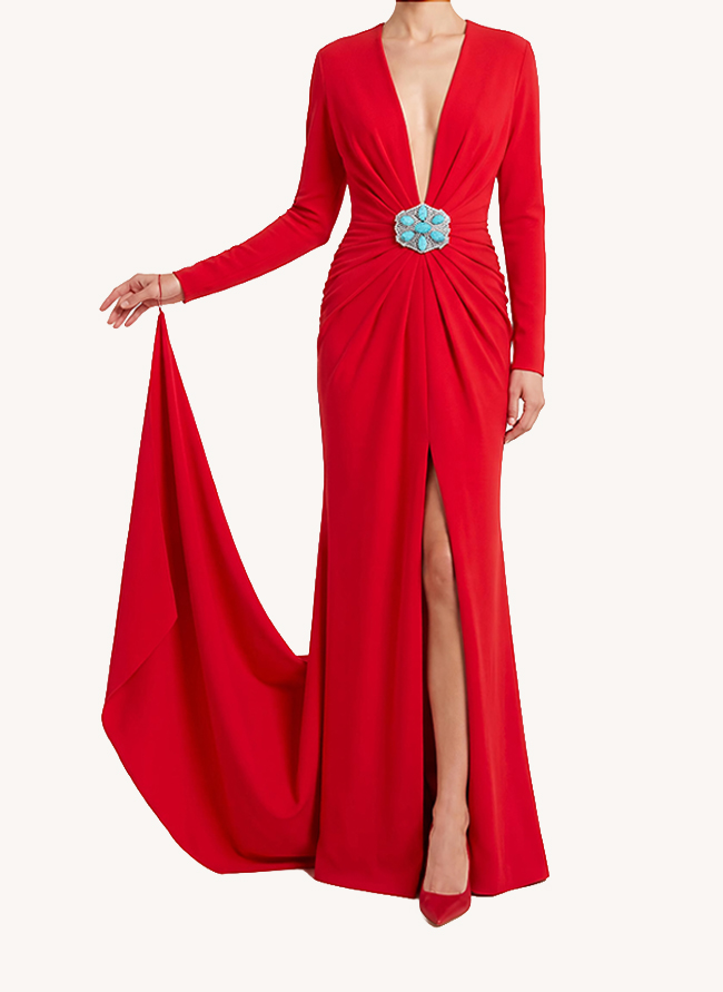 Front view of L'Heure Rouge, a red crêpe gown with plunging neckline and turquoise clasp at the waist