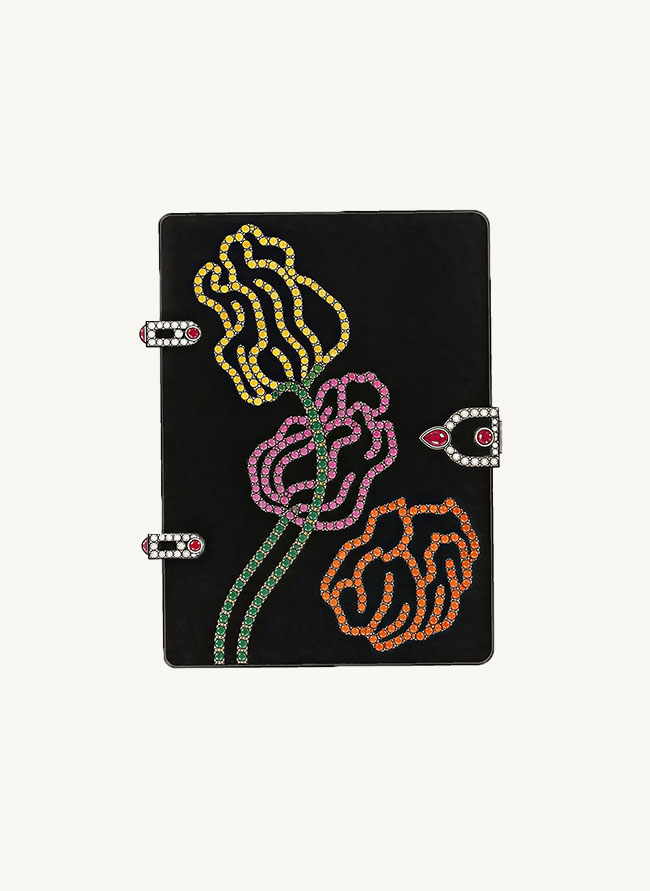 Illustrated plate of Poudrier Trois Roses, a black jade compact with three roses drawn in yellow, pink and orange sapphires