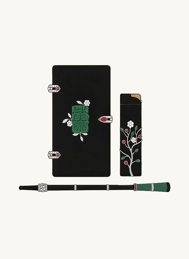Illustrated plate of Fumoir Prunus, a black jade case, lighter and pipe set with green jade, rubies and diamonds