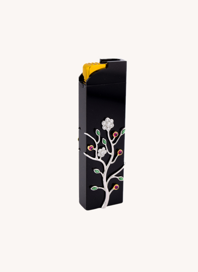 Fumoir Prunus lighter in black jade with a silver prunus branch in flower set with diamonds, emeralds and rubies