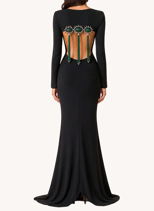 L'Heure Verte seen from the back, with three emerald medallions and hanging emerald tassels